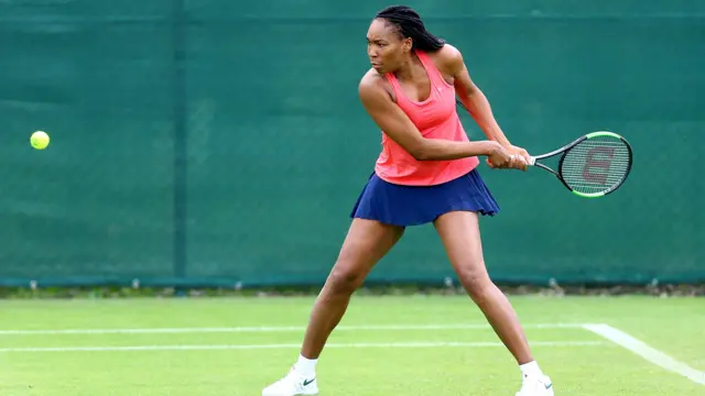 Venus Williams plays a backhand during a practice session in Birmingham