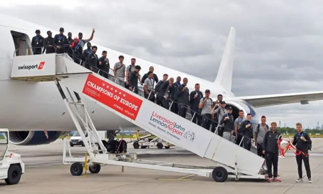 Liverpool FC arrive at Liverpool John Lennon Airport