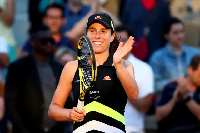 Johanna Konta applauds the crowd