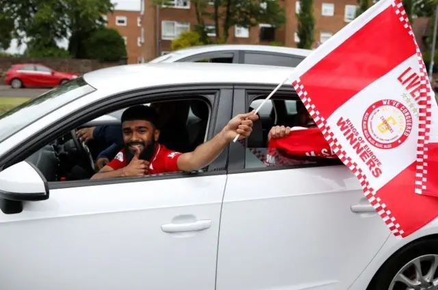 Liverpool fan in car