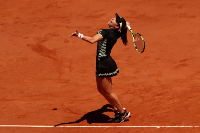 Johanna Konta serves