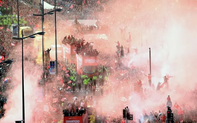 Liverpool FC parade passes along The Strand