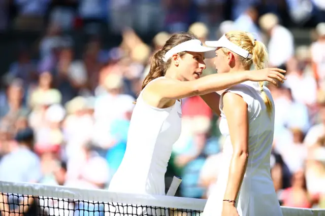 Konta and Vekic hug after playing each other at Wimbledon