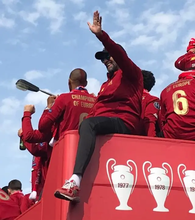 Jurgen Klopps waves to crowd