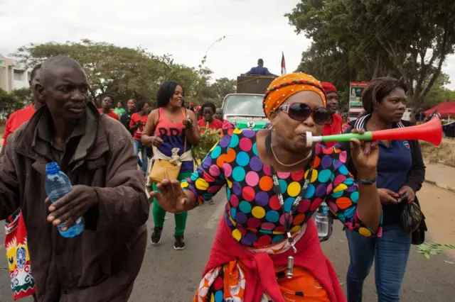 Supporters of Malawi Congress Party (MCP) Leader Lazarus Chakwera shout slogans while marching from their party headquarters to Capital Hill, Government Headquarters in Lilongwe, June 4, 2019, in protest against the recent election of President Peter Mutharika