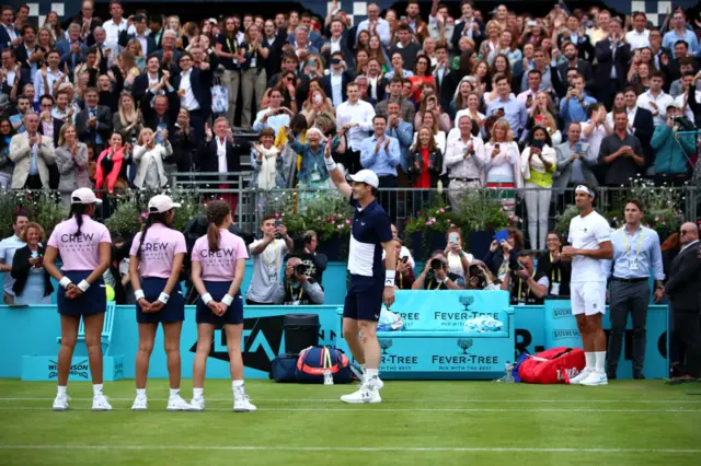 Murray waves to the crowd