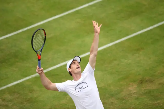 Andy Murray serves