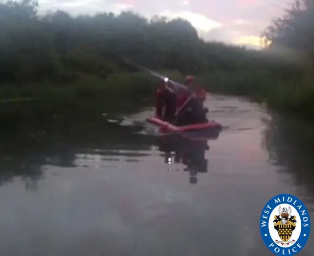 Officers in boat