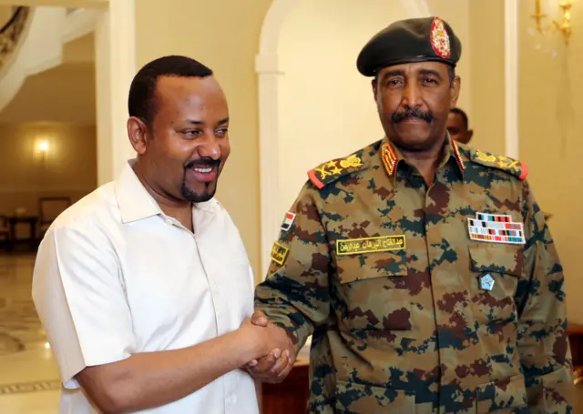 Ethiopian Prime Minister Abiy Ahmed meets the head of Sudan"s Transitional Military Council, Lieutenant General Abdel Fattah Al-Burhan