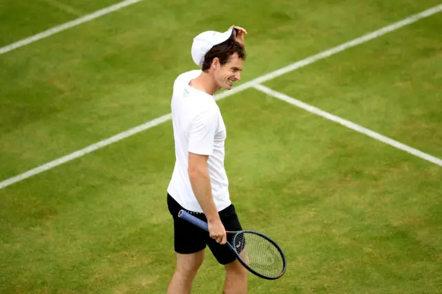 Andy Murray smiles on court