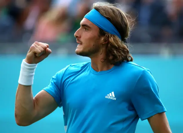 Tsitsipas pumps his fist in celebration