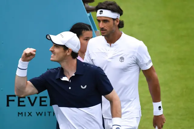 Andy Murray fist pumps in celebration