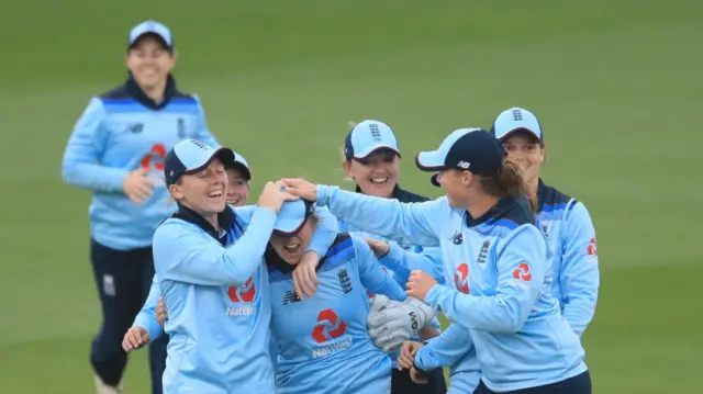 England's Fran Wilson celebrates with her teammates