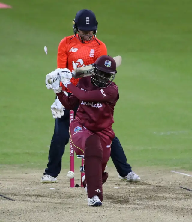 West Indies' Kycia Knight is bowled out by Katherine Brunt