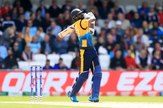 Isuru Udana bats during the ICC Cricket World Cup group stage match at Headingley, Leeds