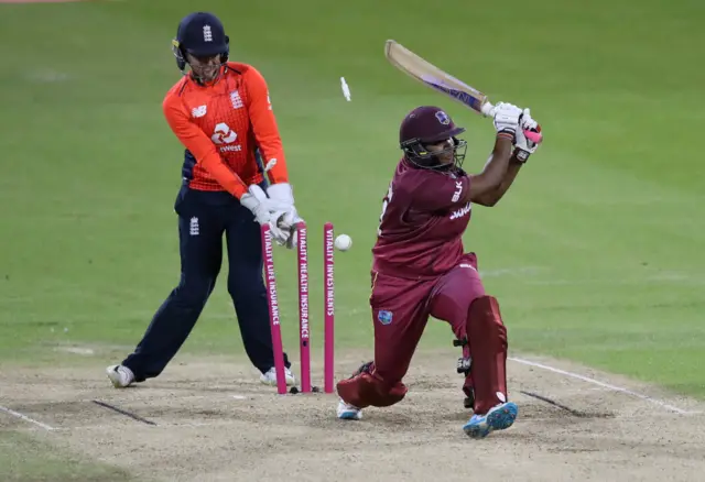 West Indies' Natasha McLean is bowled out by England's Katherine Brunt