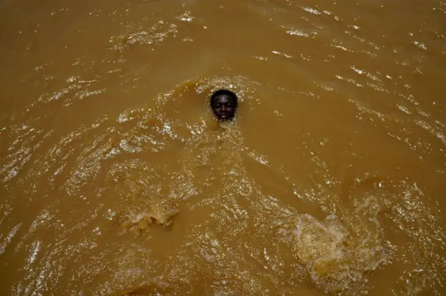 Boy in river