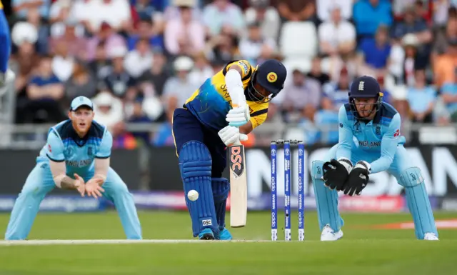 Jeevan Mendis in action as he was caught and bowled by England's Adil Rashid