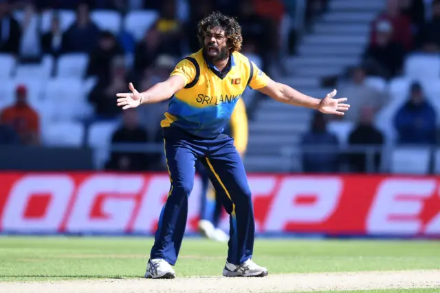 Lasith Malinga successfully appeals for the wicket of England"s Joe Root for 57 runs