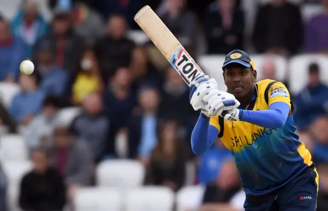 Angelo Mathews watches the ball after playing a shot