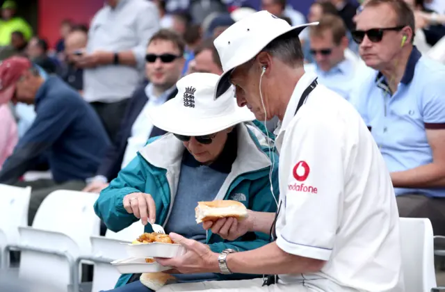 England fans share some food during the ICC Cricket World Cup group stage match at Headingley, Leeds