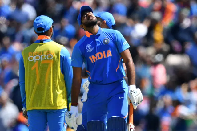 Vijay Shankar reacts as he walks back to the pavilion after his dismissal