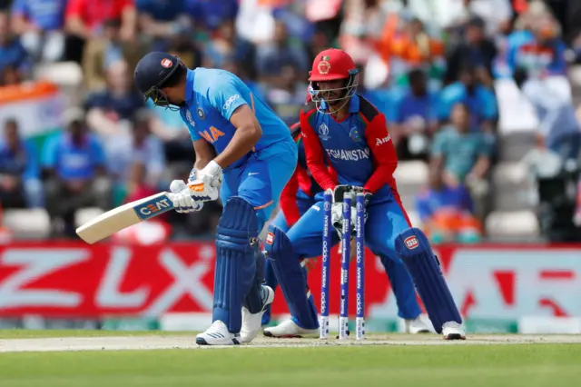 Rohit Sharma is bowled by Afghanistan's Mujeeb Ur Rahman