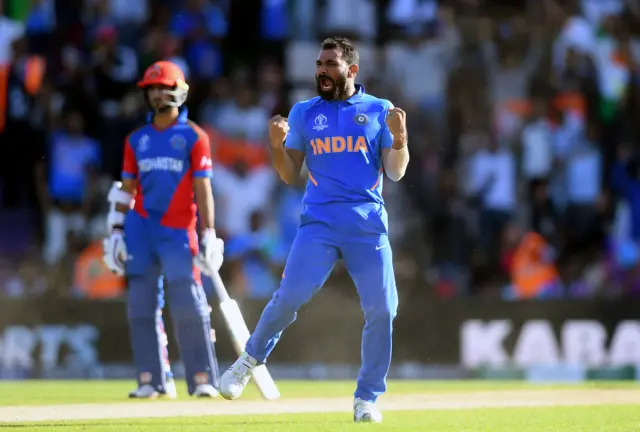 Mohammed Shami of India celebrates the wicket of Mujeeb Ur Rahman of Afghanistan