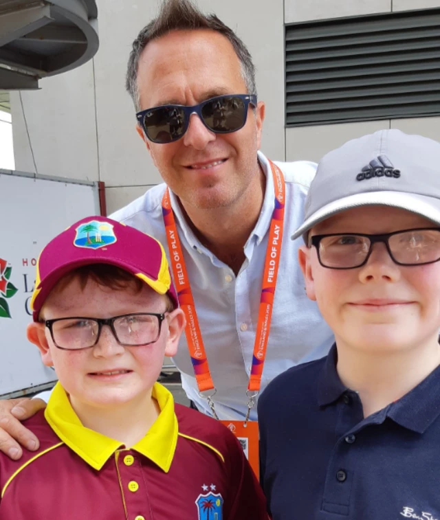 Michael Vaughan with two young fans