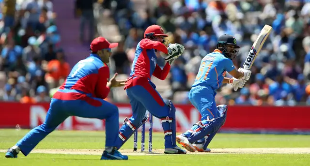 Kedar Jadhav (right) bats during the ICC Cricket World Cup group stage match at the Hampshire Bowl, Southampto