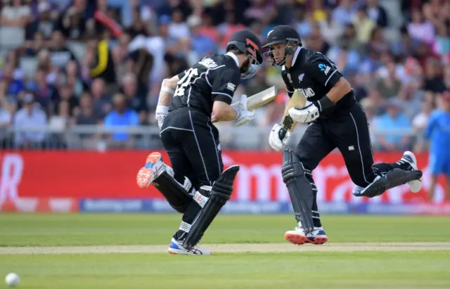 New Zealand's captain Kane Williamson (left) and Ross Taylor run between the wickets