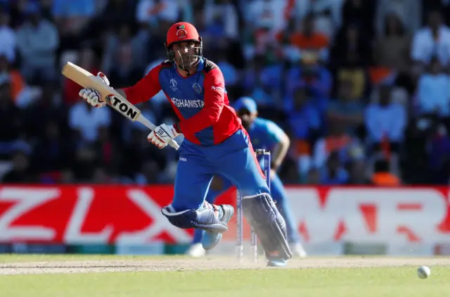 Afghanistan's Mohammad Nabi in action