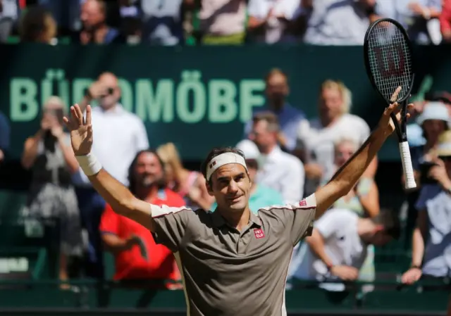 Roger Federer celebrates