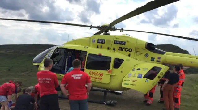 Casualty being loaded into air ambulance