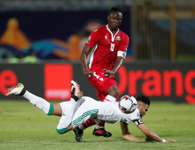 Algeria"s Riyad Mahrez in action with Kenya"s Victor Wanyama