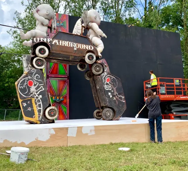 Workers at the Unfairground