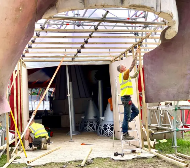 Workers put finishing touches to Glastonbury