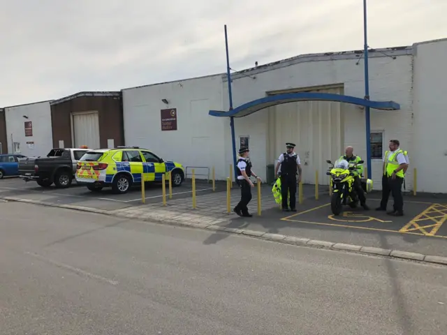 Police officers in Lowlands Industrial Estate