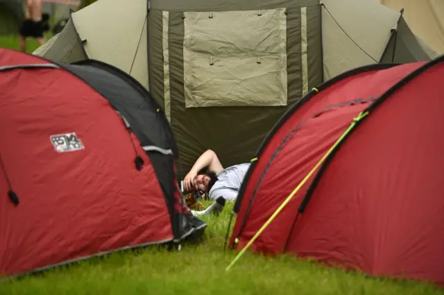 Asleep outside a tent