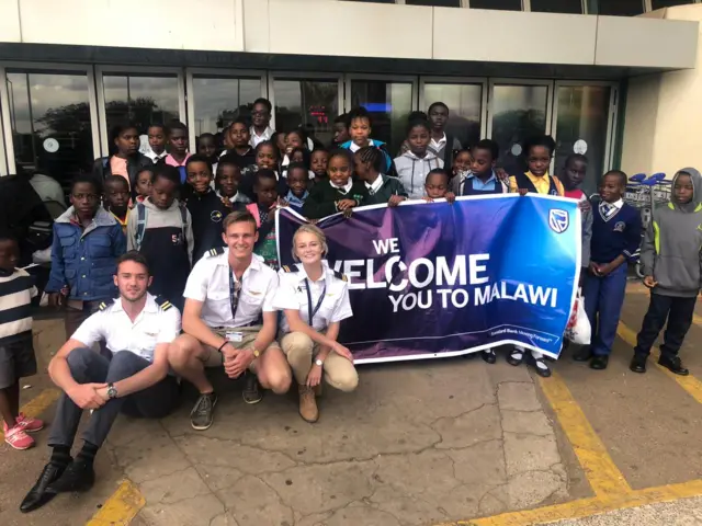 Pilots with schoolchildren in Malawi