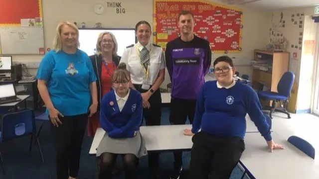 Pupils, staff and police at the school in Longton