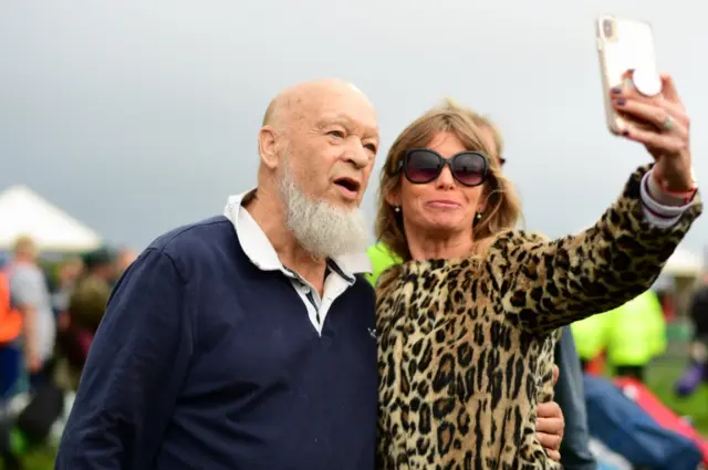 Michael Eavis poses for a selfie