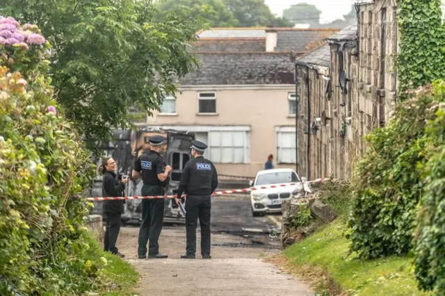 Police officers at the scene.