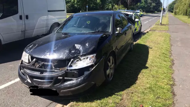 The damaged car