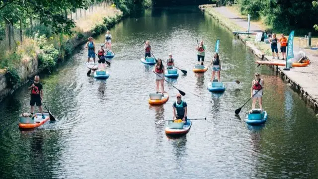 People on paddleboards