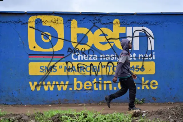 A defaced advert for a gambling company in Kenya