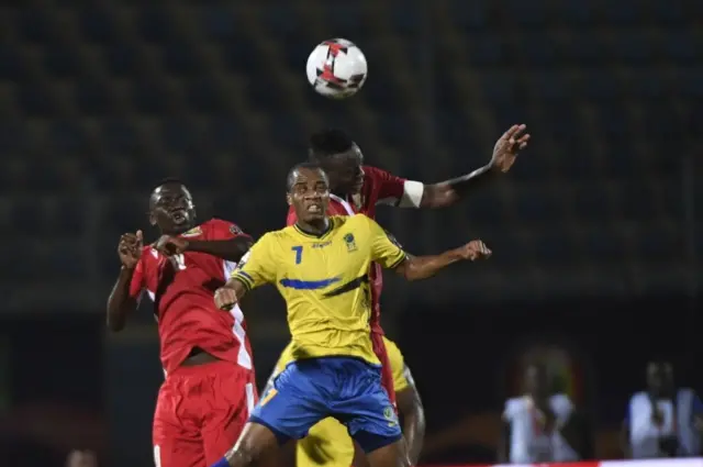 Tanzania"s midfielder Himid Mao heads the ball during the 2019 Africa Cup of Nations (CAN) football match between Kenya and Tanzania at the Stadium in Cairo on June 27, 2019