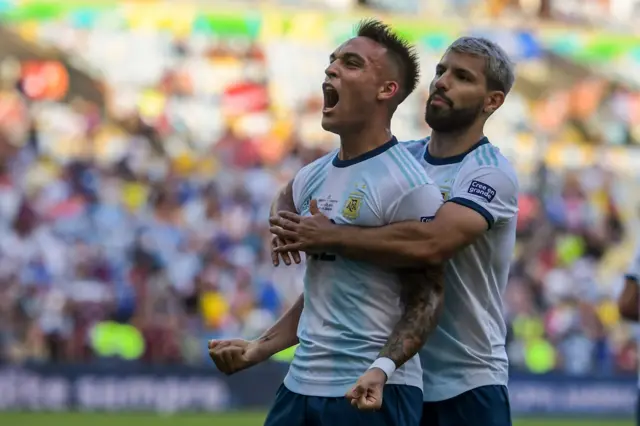 Lautaro Martinez and Sergio Aguero celebrate