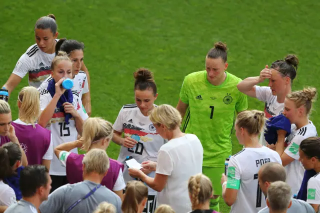 Germany take time to gather their thoughts during the cooling break