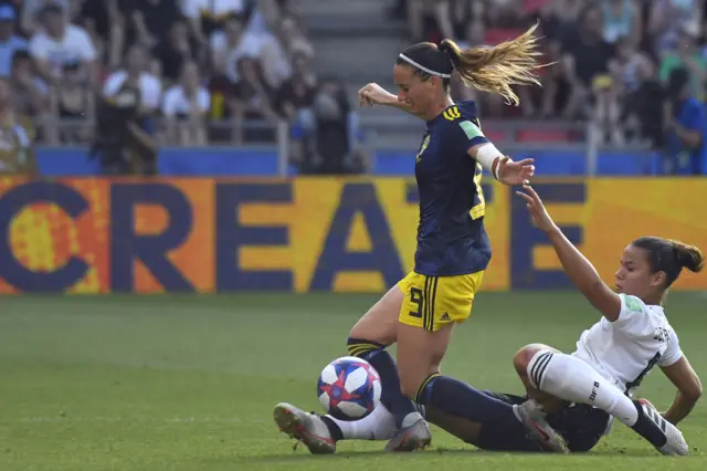 Lena Oberdorf fouls Sweden's Kosovare Asllani